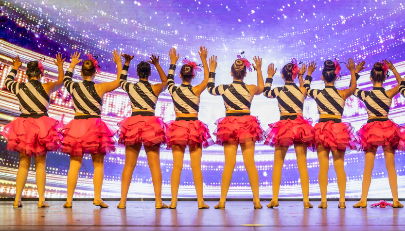 Bella Ballet Young Dancers On Stage In Striped Tops And Pink Tutus With Tan Jazz Shoes