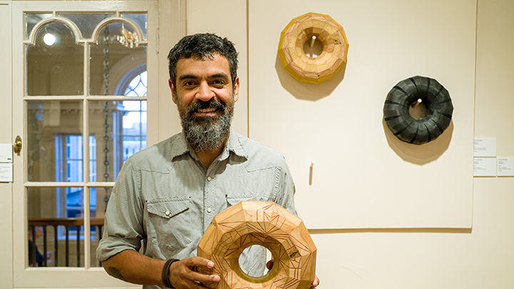 Artist Francisco Franc Rosario With His Sculptures