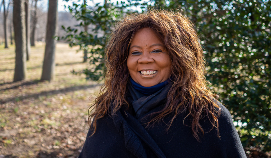 Brenda Lee Richardson Standing In A Forest