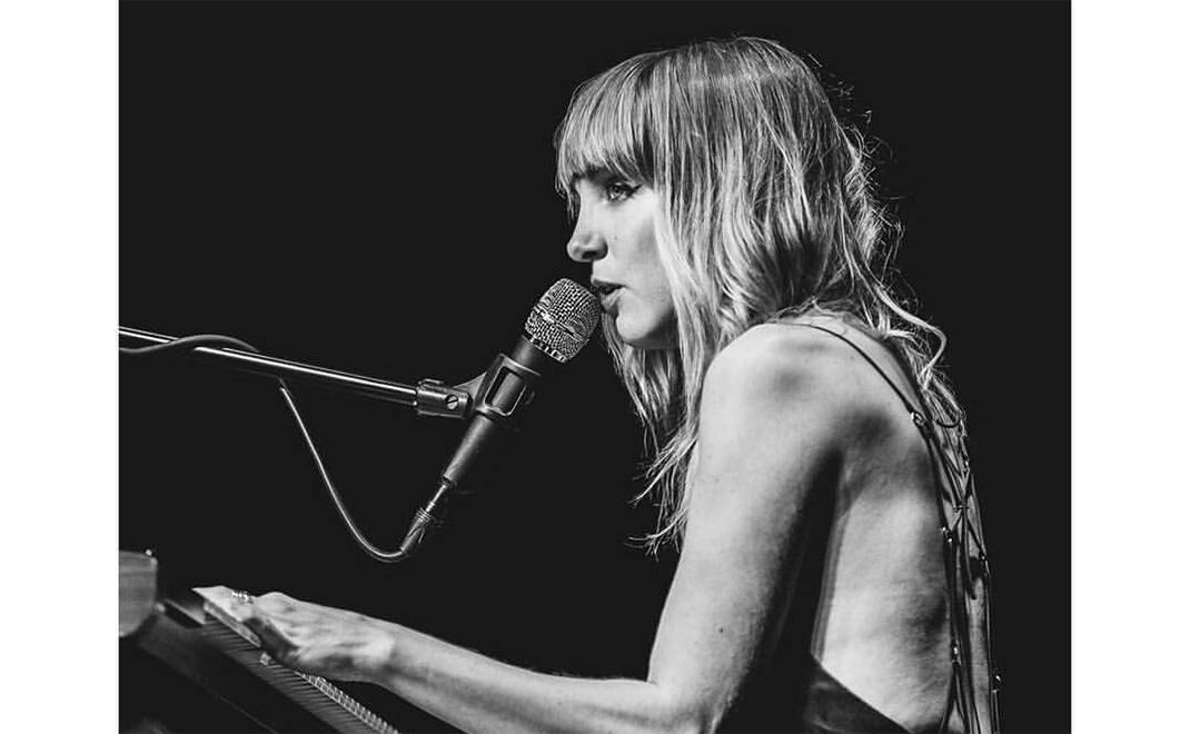 Laura Burhenn Performing At The Piano