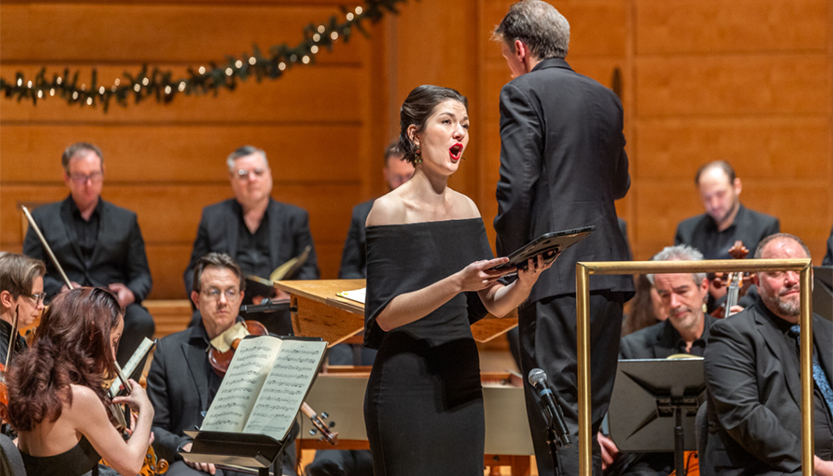 Washington Bach Consort Christmas Story Soloist Sings In Front Of An Orchestra