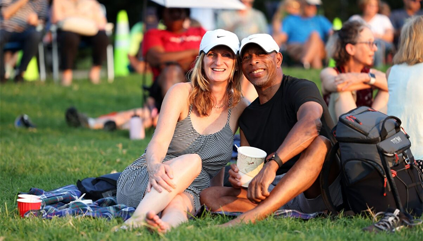 Couple Enjoying A Live From The Lawn Performance