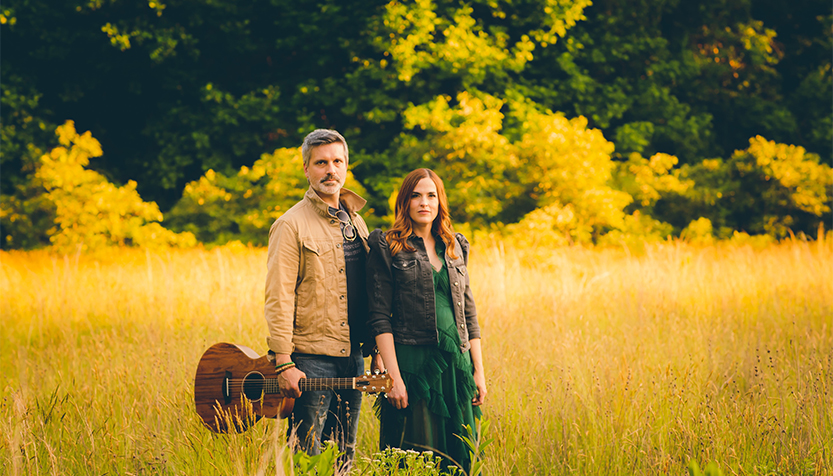 Juliet Lloyd And Steve Quintilian Standing In A Field