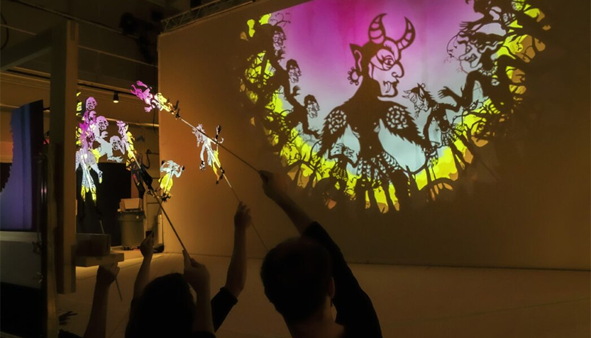 Song Of The North Puppeteers Using Shadow Puppetry To Project Folk Tales